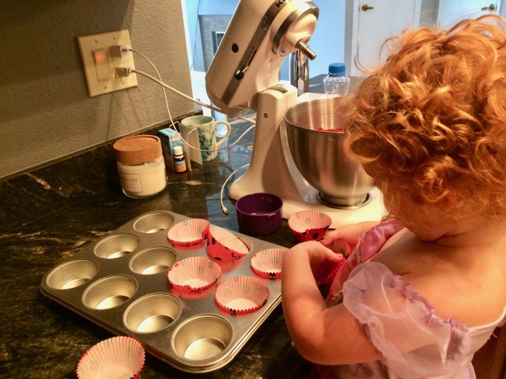 making ladybug cupcakes