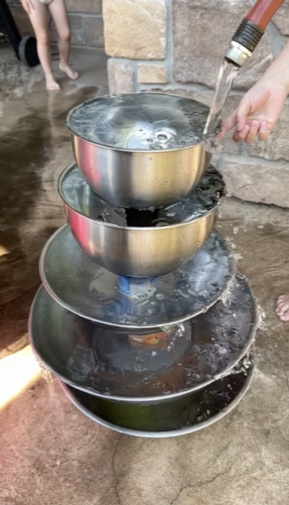 stacked bowls for summertime water play waterfall