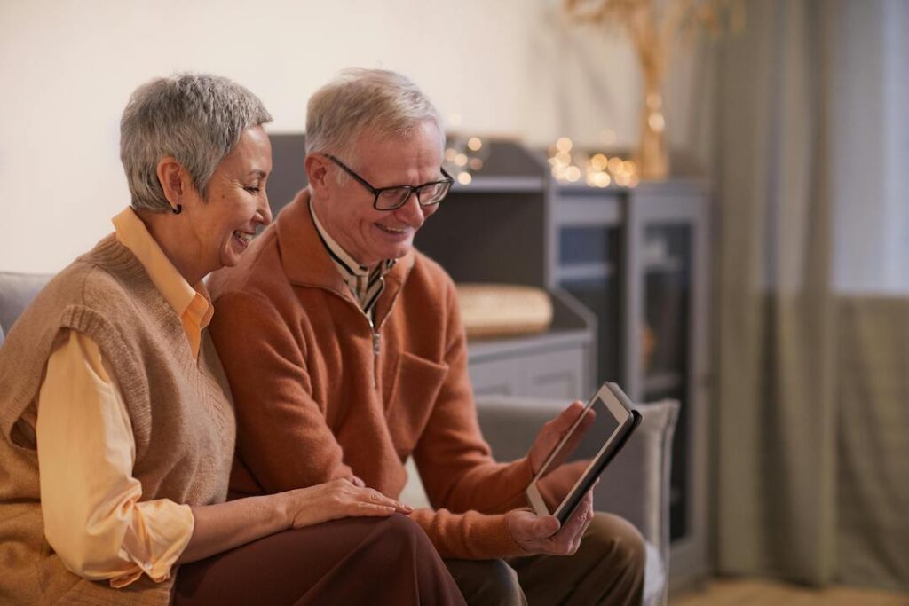 grandparents talking to grandchildren on ipad