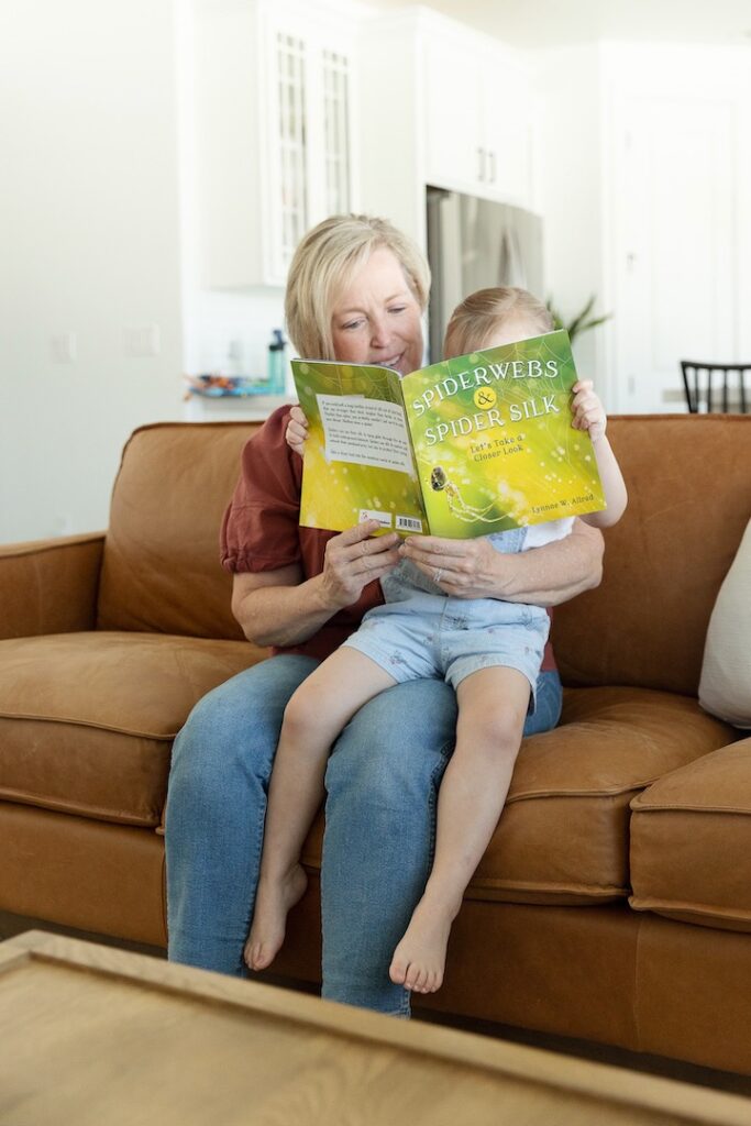 Lynnae reading Spiderwebs and Spider Silk 