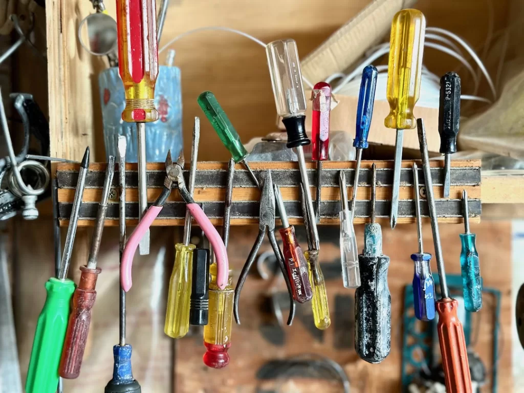 assortment of screwdrivers on magnetic strip