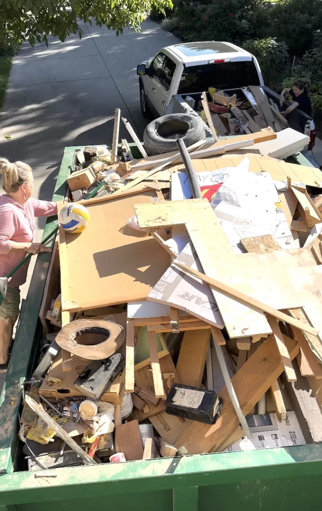 dumpster full of garage refuse